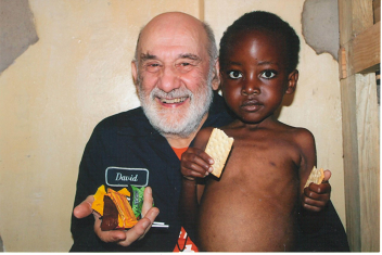 Dr. Simone picture with a child